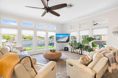 Welcome to 2110 Harbor Ct, a custom waterfront retreat located on Rockport Country Club in Texas - for sale on GolfHomes.com, golf home, golf lot