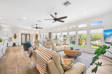 Welcome to 2110 Harbor Ct, a custom waterfront retreat located on Rockport Country Club in Texas - for sale on GolfHomes.com, golf home, golf lot