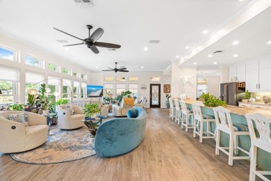 Welcome to 2110 Harbor Ct, a custom waterfront retreat located on Rockport Country Club in Texas - for sale on GolfHomes.com, golf home, golf lot