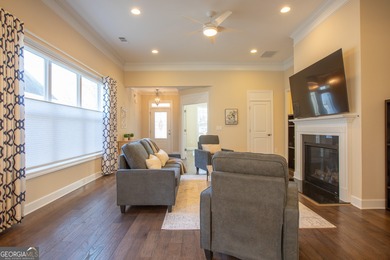 Discover relaxed, resort-style living in this charming on Lanier Island Legacy Golf Couorse in Georgia - for sale on GolfHomes.com, golf home, golf lot