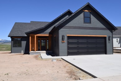 This modern and spacious Ranch Club home is full of beautiful on The Ranch Club in Montana - for sale on GolfHomes.com, golf home, golf lot