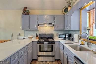 This large 4-bedroom, 3-bedroom home is waiting for new owners on Sky Valley Resort and Country Club in Georgia - for sale on GolfHomes.com, golf home, golf lot
