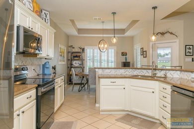 Charming 3-bedroom, 2-bath Hacienda at the SPI Golf Community on South Padre Island Golf Club in Texas - for sale on GolfHomes.com, golf home, golf lot