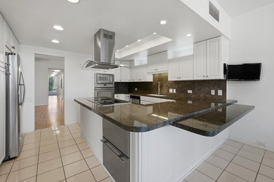 Vacation at home in this three-bedroom, three-bathroom condo in on Desert Island Golf and Country Club in California - for sale on GolfHomes.com, golf home, golf lot