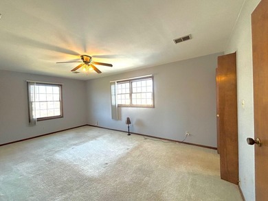 Welcome home to this beautifully maintained 3 Bedroom, 3 on Lakes of the Four Seasons Country Club in Indiana - for sale on GolfHomes.com, golf home, golf lot