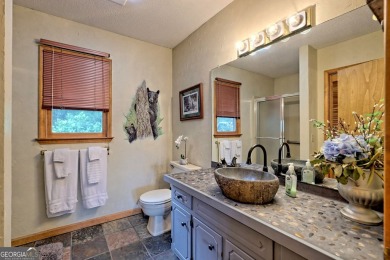 This large 4-bedroom, 3-bedroom home is waiting for new owners on Sky Valley Resort and Country Club in Georgia - for sale on GolfHomes.com, golf home, golf lot
