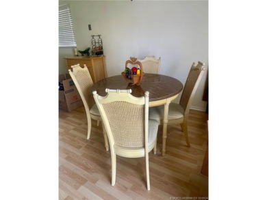 2nd floor 1/1 1/2 furnished condo in a very active 55+ on Pine Lakes Golf Club in Florida - for sale on GolfHomes.com, golf home, golf lot