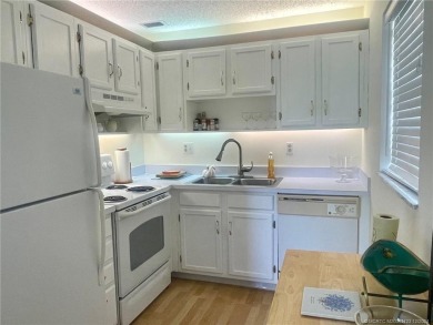 2nd floor 1/1 1/2 furnished condo in a very active 55+ on Pine Lakes Golf Club in Florida - for sale on GolfHomes.com, golf home, golf lot