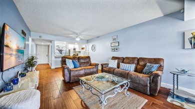Beautifully updated 2-bed, 2-bath condo in Whitehall at Pine on Pine Island Ridge Country Club in Florida - for sale on GolfHomes.com, golf home, golf lot
