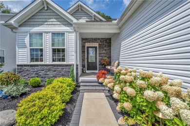 Poised in the coveted Quail Hollow community, this showstopper on Quail Hollow Resort and Country Club in Ohio - for sale on GolfHomes.com, golf home, golf lot