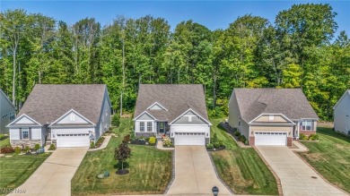 Poised in the coveted Quail Hollow community, this showstopper on Quail Hollow Resort and Country Club in Ohio - for sale on GolfHomes.com, golf home, golf lot