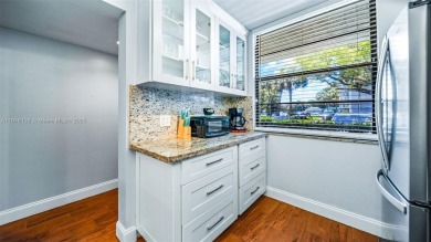 Beautifully updated 2-bed, 2-bath condo in Whitehall at Pine on Pine Island Ridge Country Club in Florida - for sale on GolfHomes.com, golf home, golf lot