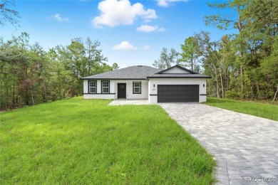 Come fall in love with this beautifully designed NEW on Citrus Springs Country Club in Florida - for sale on GolfHomes.com, golf home, golf lot