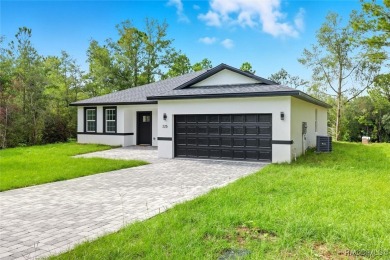 Come fall in love with this beautifully designed NEW on Citrus Springs Country Club in Florida - for sale on GolfHomes.com, golf home, golf lot