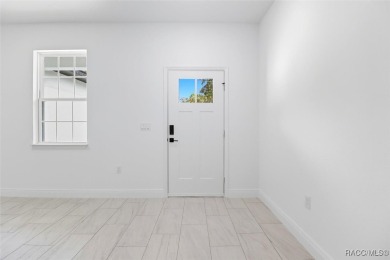 Come fall in love with this beautifully designed NEW on Citrus Springs Country Club in Florida - for sale on GolfHomes.com, golf home, golf lot