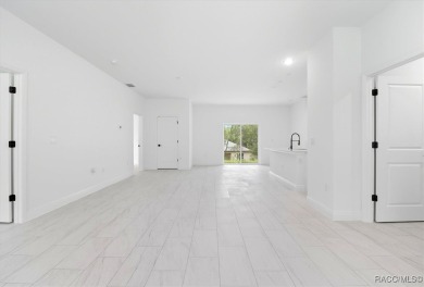 Come fall in love with this beautifully designed NEW on Citrus Springs Country Club in Florida - for sale on GolfHomes.com, golf home, golf lot