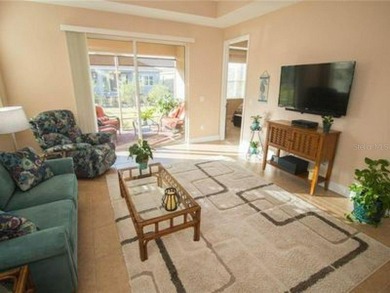 This is the perfect 1,493 sq. ft. home for warmth seeking on Sandpiper Golf Club in Florida - for sale on GolfHomes.com, golf home, golf lot