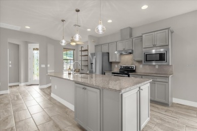 Pristine Condition! Enjoy resort style living in this beautiful on Ridgewood Lakes Golf and Country Club in Florida - for sale on GolfHomes.com, golf home, golf lot
