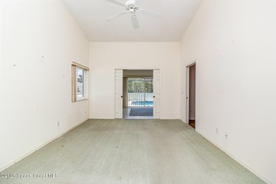 This popular expanded Montpelier model, located in a on Indian River Colony Club in Florida - for sale on GolfHomes.com, golf home, golf lot