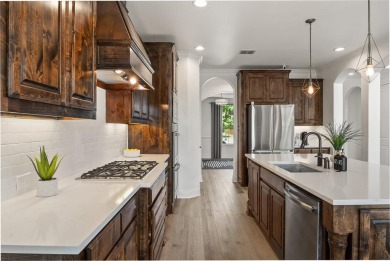 Welcome to this beautifully updated 3,628 sq ft, 4-bedroom home on Trophy Club of Dallas in Texas - for sale on GolfHomes.com, golf home, golf lot