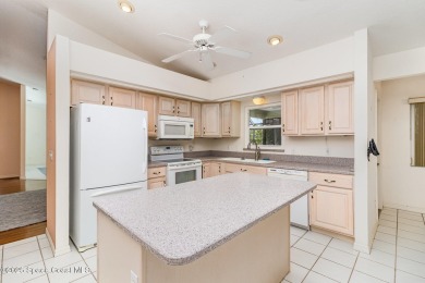 This popular expanded Montpelier model, located in a on Indian River Colony Club in Florida - for sale on GolfHomes.com, golf home, golf lot
