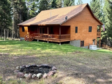 Immaculate custom home with room to roam. 3 BR, 2 BA 2,656 total on Double Arrow Lodge in Montana - for sale on GolfHomes.com, golf home, golf lot