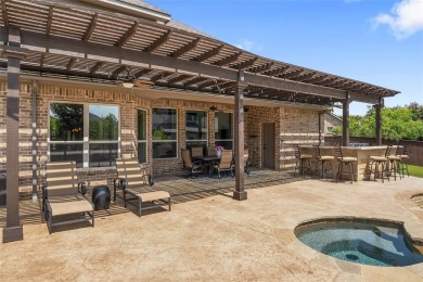 Welcome to this beautifully updated 3,628 sq ft, 4-bedroom home on Trophy Club of Dallas in Texas - for sale on GolfHomes.com, golf home, golf lot