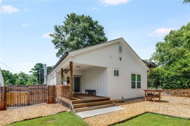 Welcome to this beautifully renovated 3-bedroom, 2-bathroom home on John A. White Golf Course in Georgia - for sale on GolfHomes.com, golf home, golf lot