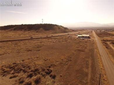Prime commercial lot with highway visibility! Utilities ready in on  in Colorado - for sale on GolfHomes.com, golf home, golf lot