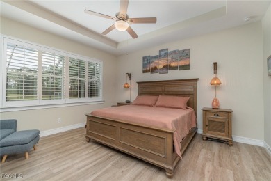 Stunning Golf & Lake Views | Oversized Saltwater Pool | on Herons Glen Golf and Country Club in Florida - for sale on GolfHomes.com, golf home, golf lot