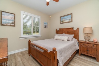 Stunning Golf & Lake Views | Oversized Saltwater Pool | on Herons Glen Golf and Country Club in Florida - for sale on GolfHomes.com, golf home, golf lot