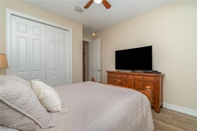 Stunning Golf & Lake Views | Oversized Saltwater Pool | on Herons Glen Golf and Country Club in Florida - for sale on GolfHomes.com, golf home, golf lot