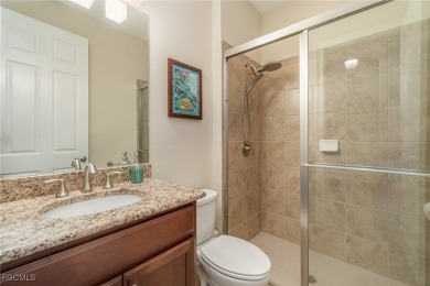 Stunning Golf & Lake Views | Oversized Saltwater Pool | on Herons Glen Golf and Country Club in Florida - for sale on GolfHomes.com, golf home, golf lot