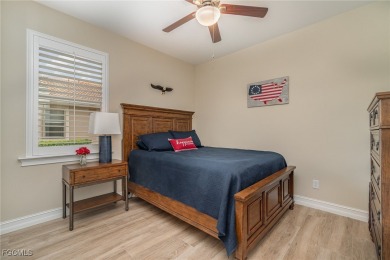 Stunning Golf & Lake Views | Oversized Saltwater Pool | on Herons Glen Golf and Country Club in Florida - for sale on GolfHomes.com, golf home, golf lot
