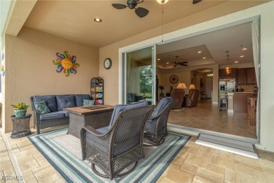 Stunning Golf & Lake Views | Oversized Saltwater Pool | on Herons Glen Golf and Country Club in Florida - for sale on GolfHomes.com, golf home, golf lot