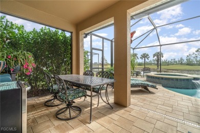 Stunning Golf & Lake Views | Oversized Saltwater Pool | on Herons Glen Golf and Country Club in Florida - for sale on GolfHomes.com, golf home, golf lot