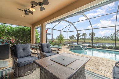 Stunning Golf & Lake Views | Oversized Saltwater Pool | on Herons Glen Golf and Country Club in Florida - for sale on GolfHomes.com, golf home, golf lot