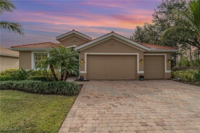 Stunning Golf & Lake Views | Oversized Saltwater Pool | on Herons Glen Golf and Country Club in Florida - for sale on GolfHomes.com, golf home, golf lot
