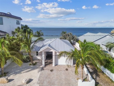 Discover your beachfront oasis directly on Tampa Bay! Step out on Key Royale Club in Florida - for sale on GolfHomes.com, golf home, golf lot