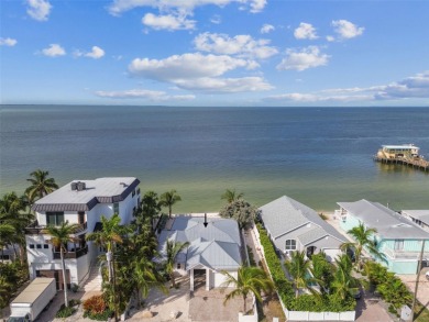 Discover your beachfront oasis directly on Tampa Bay! Step out on Key Royale Club in Florida - for sale on GolfHomes.com, golf home, golf lot