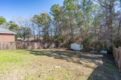 Take a look at this charming 4-bedroom, 2-bath home, perfect for on Diamondhead Country Club in Mississippi - for sale on GolfHomes.com, golf home, golf lot