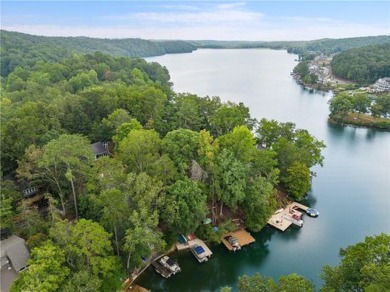 Discover your dream deep water cove home in the beautiful Lake on The Highlands Course at Lake Arrowhead in Georgia - for sale on GolfHomes.com, golf home, golf lot