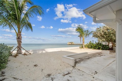 Discover your beachfront oasis directly on Tampa Bay! Step out on Key Royale Club in Florida - for sale on GolfHomes.com, golf home, golf lot