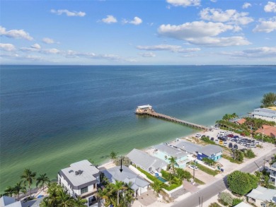 Discover your beachfront oasis directly on Tampa Bay! Step out on Key Royale Club in Florida - for sale on GolfHomes.com, golf home, golf lot