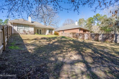 Take a look at this charming 4-bedroom, 2-bath home, perfect for on Diamondhead Country Club in Mississippi - for sale on GolfHomes.com, golf home, golf lot