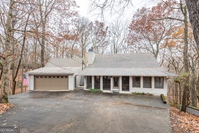 Log Cabin on Creek Frontage at the End of a Quiet Cul-de-Sac - on Bent Tree Golf Course in Georgia - for sale on GolfHomes.com, golf home, golf lot