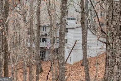 Log Cabin on Creek Frontage at the End of a Quiet Cul-de-Sac - on Bent Tree Golf Course in Georgia - for sale on GolfHomes.com, golf home, golf lot