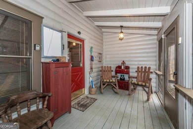 Log Cabin on Creek Frontage at the End of a Quiet Cul-de-Sac - on Bent Tree Golf Course in Georgia - for sale on GolfHomes.com, golf home, golf lot