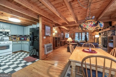 Log Cabin on Creek Frontage at the End of a Quiet Cul-de-Sac - on Bent Tree Golf Course in Georgia - for sale on GolfHomes.com, golf home, golf lot