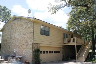 Welcome to this unique 3 bedroom/2 bath split level home located on Bellville Golf and Recreation Club in Texas - for sale on GolfHomes.com, golf home, golf lot